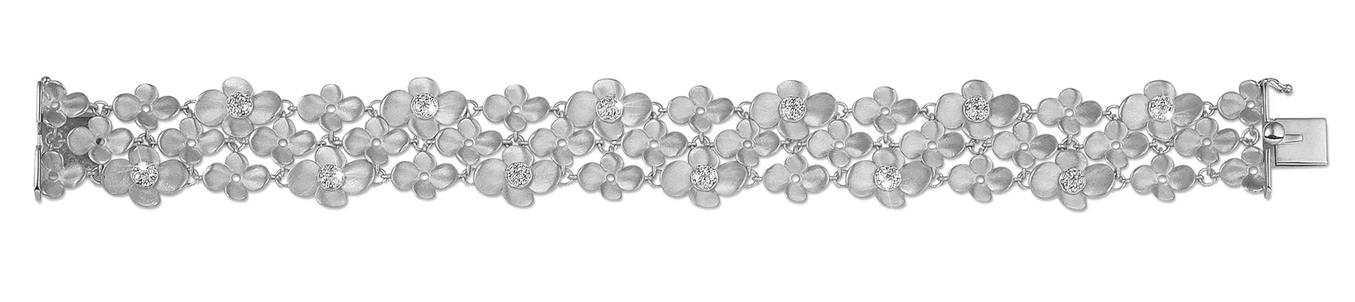 0.75 quilates pulsera diamante diseño flor en oro blanco 