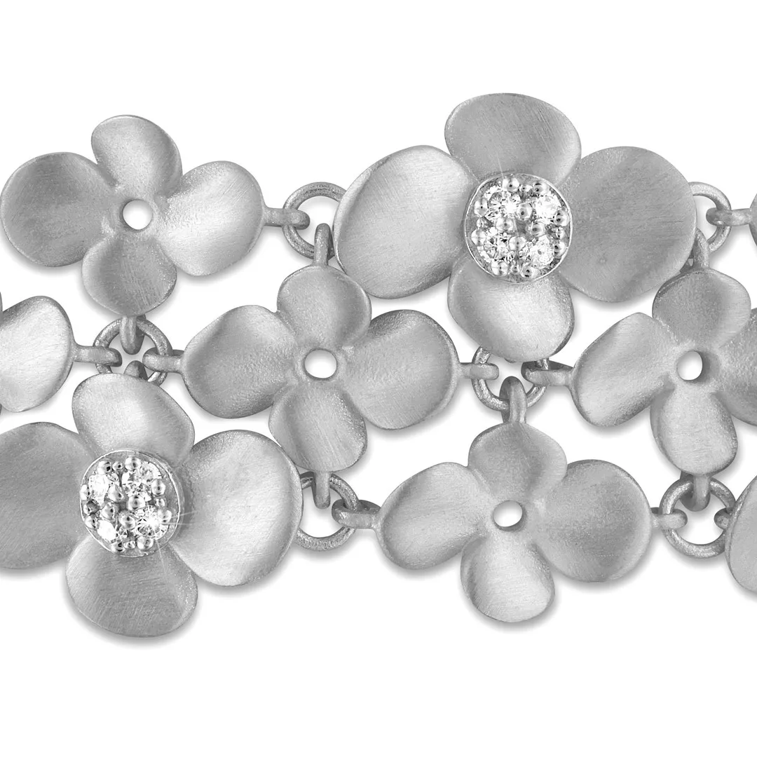 0.75 quilates pulsera diamante diseño flor en oro blanco 