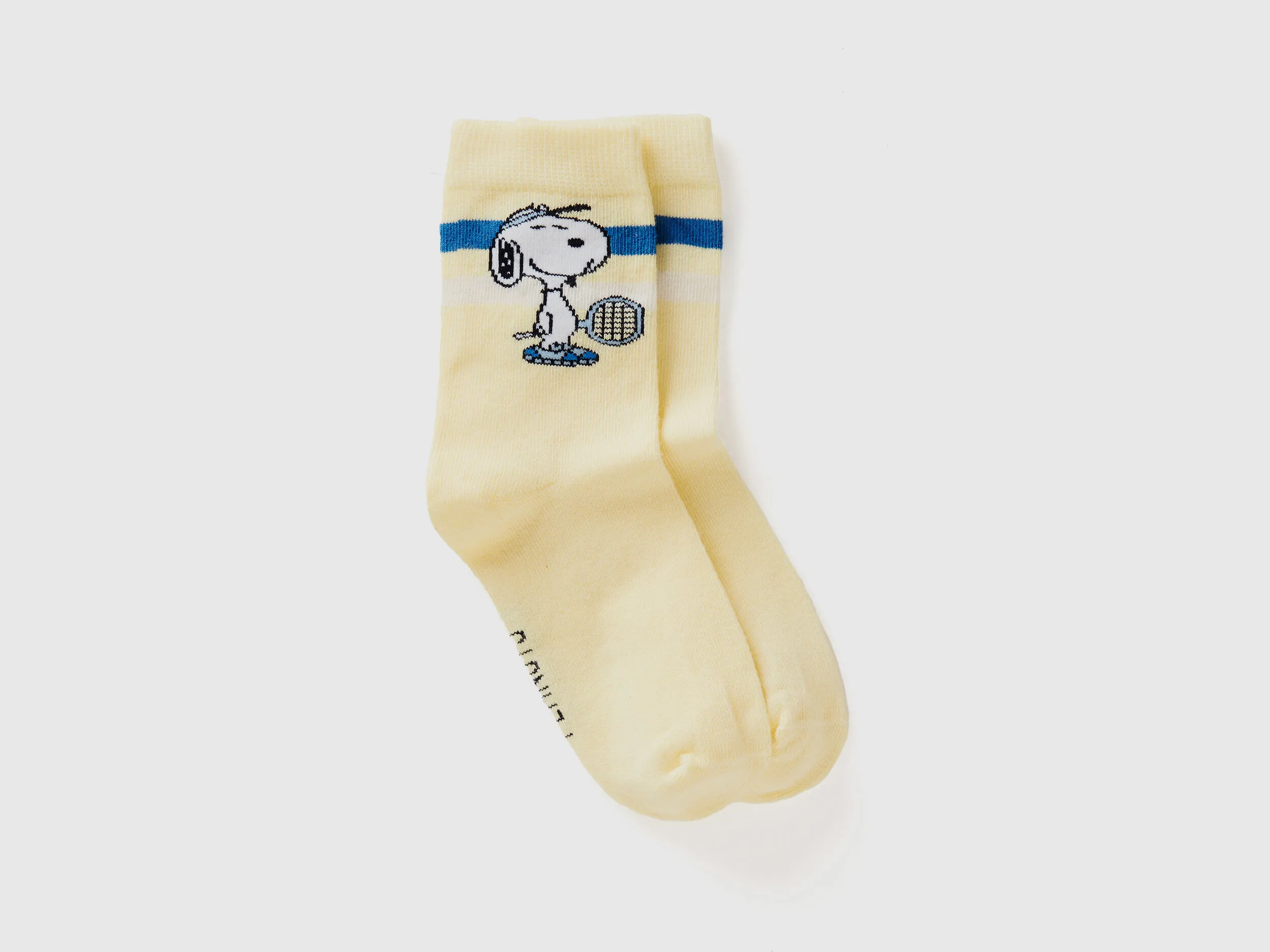 Calcetines amarillos de Snoopy ©Peanuts