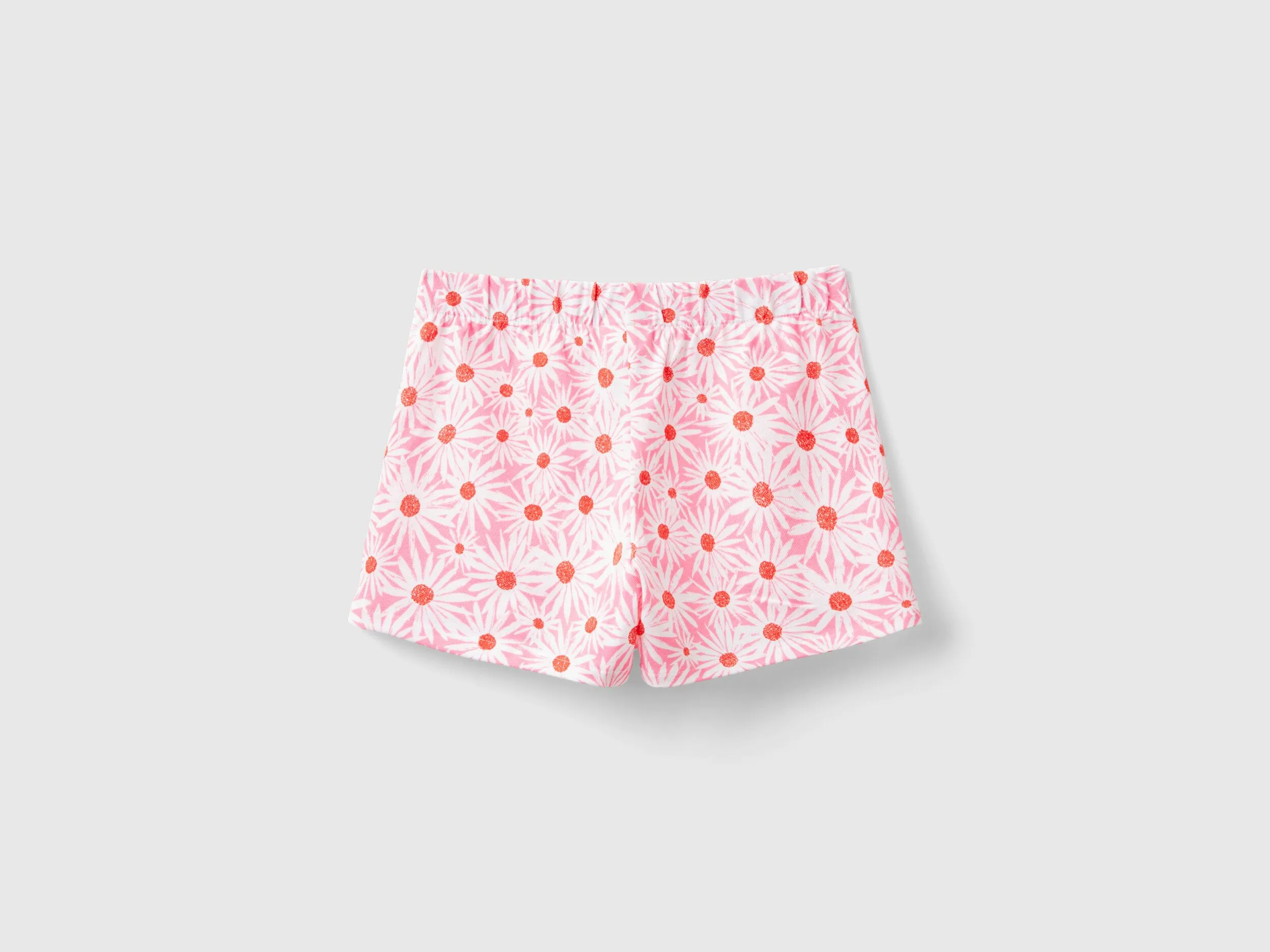 Falda pantalón rosa con estampado de flores