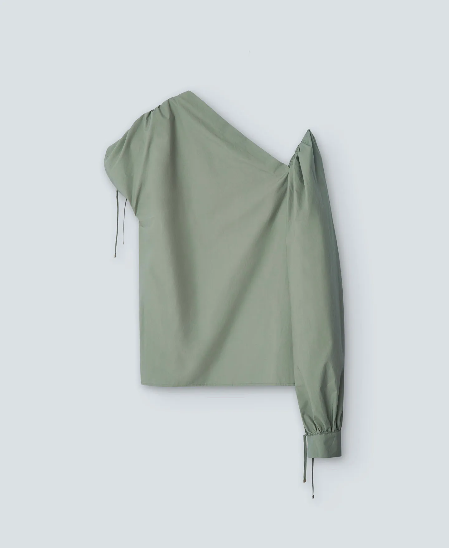 Green asymmetric top woman