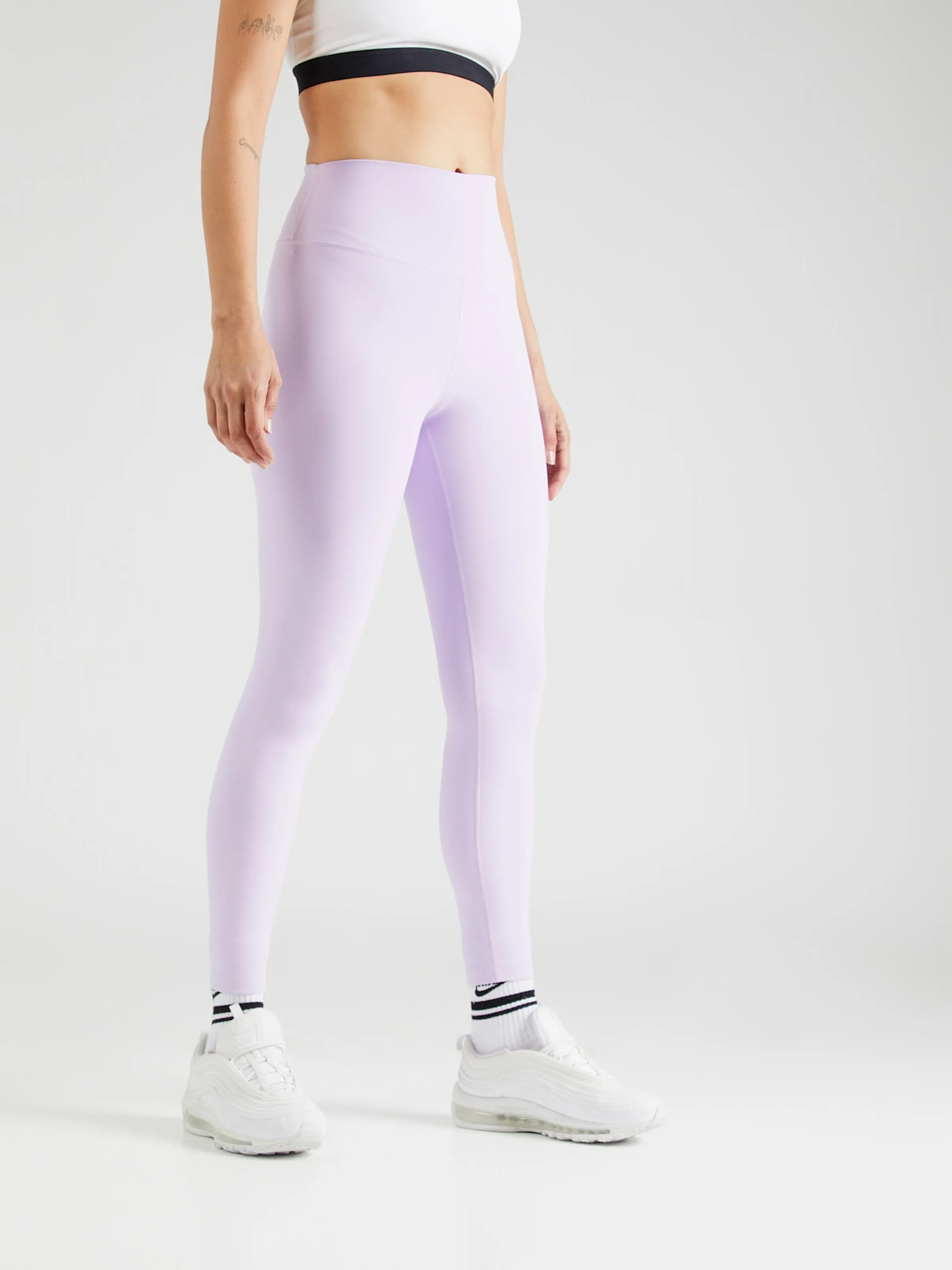 Skinny Pantalón deportivo 'ONE' NIKE en Lila